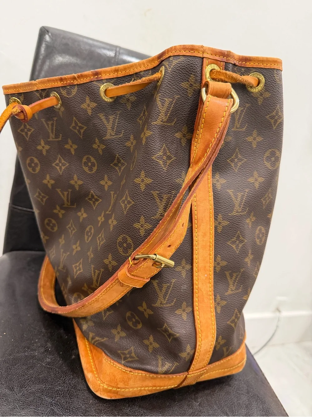 Louis Vuitton Monogram Drawstring Hobo in Brown and Tan